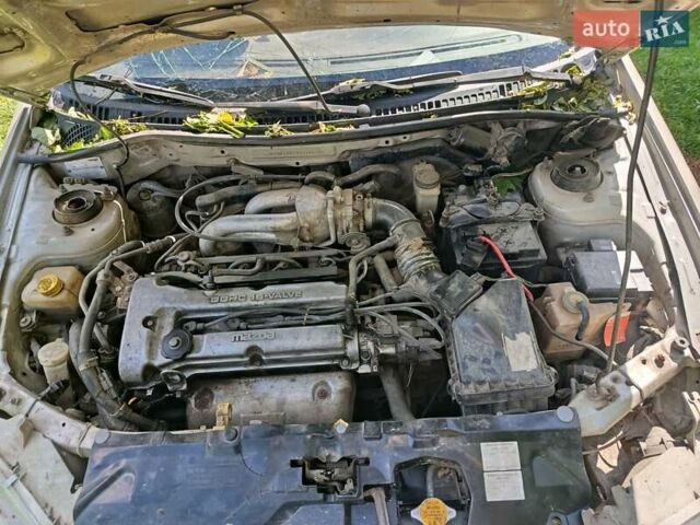 Бежевый Мазда 323, объемом двигателя 1.49 л и пробегом 280 тыс. км за 890 $, фото 6 на Automoto.ua