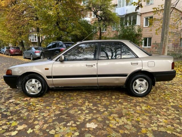 Бежевий Мазда 323, об'ємом двигуна 1.6 л та пробігом 400 тис. км за 899 $, фото 2 на Automoto.ua