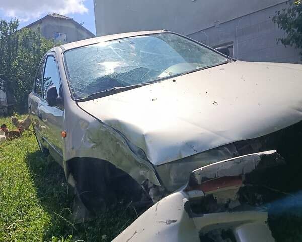 Бежевый Мазда 323, объемом двигателя 1.49 л и пробегом 280 тыс. км за 890 $, фото 4 на Automoto.ua