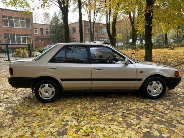 Бежевий Мазда 323, об'ємом двигуна 1.6 л та пробігом 400 тис. км за 899 $, фото 7 на Automoto.ua