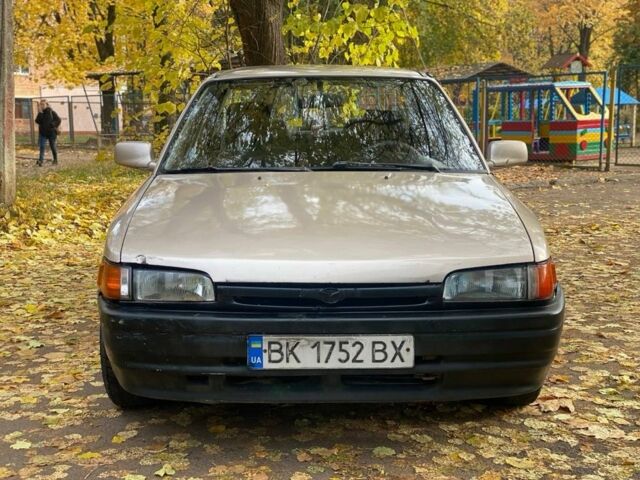 Бежевий Мазда 323, об'ємом двигуна 1.6 л та пробігом 400 тис. км за 899 $, фото 9 на Automoto.ua
