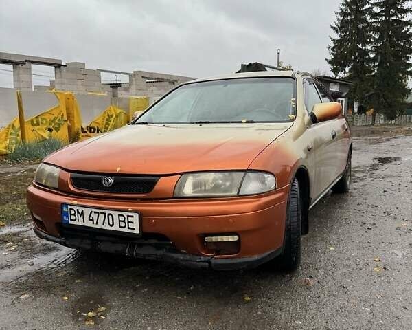 Бежевий Мазда 323, об'ємом двигуна 1.5 л та пробігом 300 тис. км за 1500 $, фото 3 на Automoto.ua