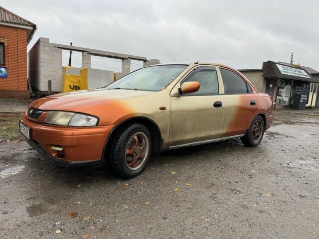 Бежевий Мазда 323, об'ємом двигуна 1.5 л та пробігом 300 тис. км за 1500 $, фото 2 на Automoto.ua