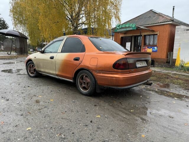 Бежевий Мазда 323, об'ємом двигуна 1.5 л та пробігом 300 тис. км за 1500 $, фото 1 на Automoto.ua