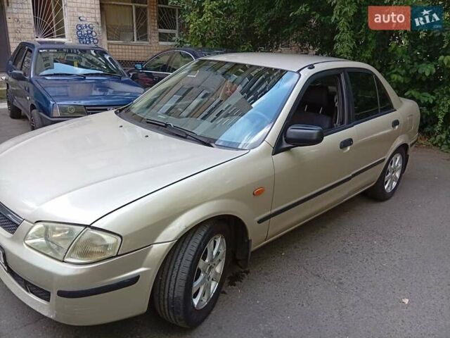Бежевый Мазда 323, объемом двигателя 1.6 л и пробегом 306 тыс. км за 3000 $, фото 2 на Automoto.ua