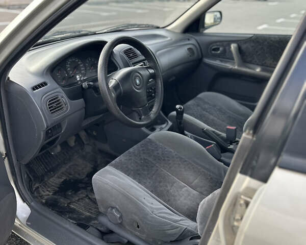 Бежевый Мазда 323, объемом двигателя 1.84 л и пробегом 512 тыс. км за 2029 $, фото 16 на Automoto.ua