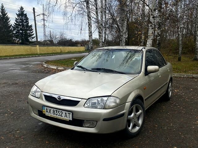 Бежевый Мазда 323, объемом двигателя 1.5 л и пробегом 318 тыс. км за 2700 $, фото 2 на Automoto.ua