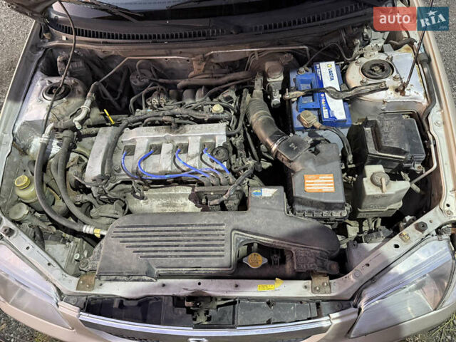 Бежевый Мазда 323, объемом двигателя 1.84 л и пробегом 512 тыс. км за 2029 $, фото 20 на Automoto.ua