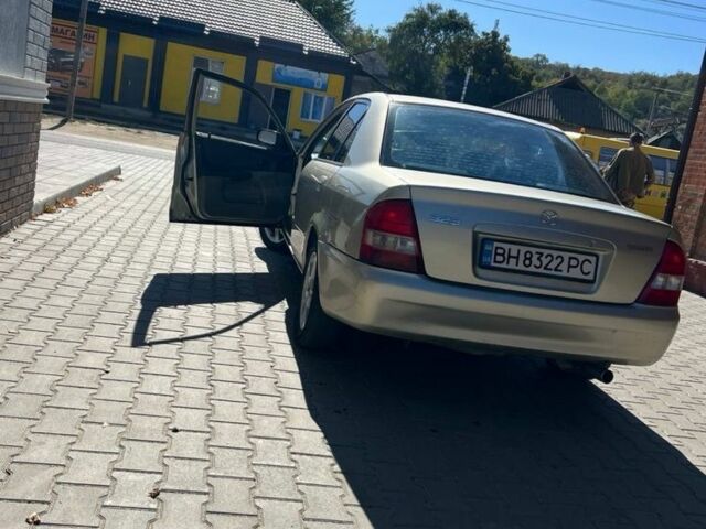 Бежевий Мазда 323, об'ємом двигуна 1.6 л та пробігом 200 тис. км за 2500 $, фото 2 на Automoto.ua