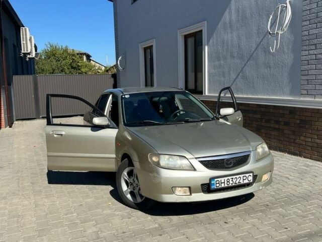 Бежевий Мазда 323, об'ємом двигуна 1.6 л та пробігом 200 тис. км за 2500 $, фото 6 на Automoto.ua