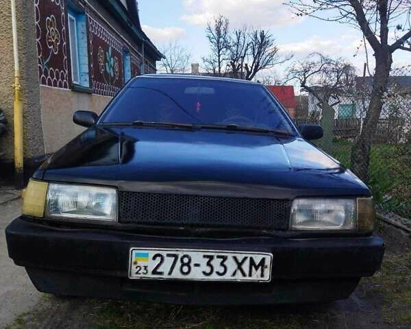 Черный Мазда 323, объемом двигателя 1.5 л и пробегом 249 тыс. км за 750 $, фото 2 на Automoto.ua