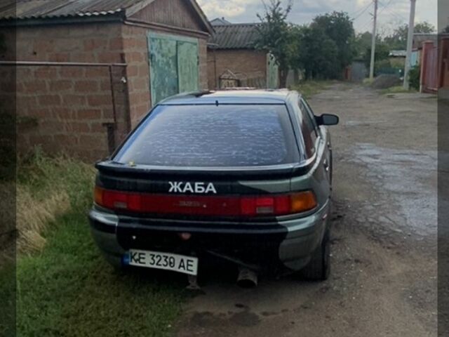 Черный Мазда 323, объемом двигателя 1.8 л и пробегом 777 тыс. км за 761 $, фото 3 на Automoto.ua