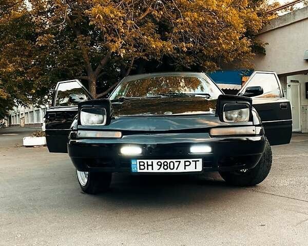 Чорний Мазда 323, об'ємом двигуна 1.8 л та пробігом 300 тис. км за 2000 $, фото 4 на Automoto.ua