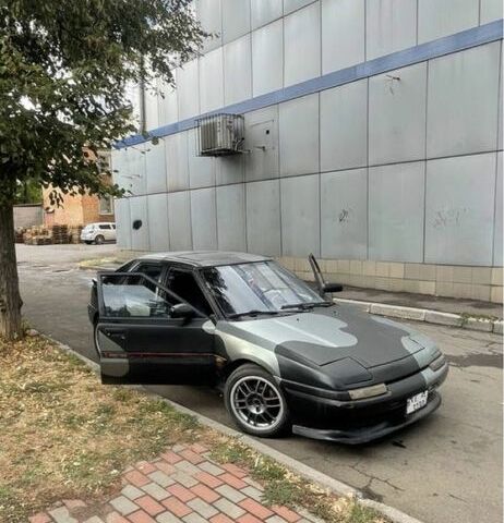 Черный Мазда 323, объемом двигателя 1.8 л и пробегом 777 тыс. км за 761 $, фото 4 на Automoto.ua