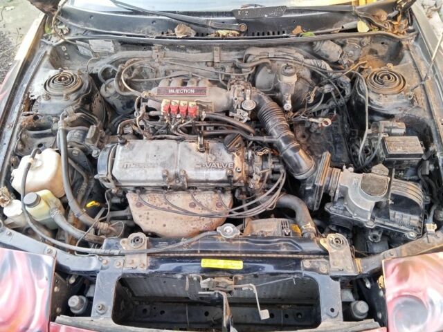 Черный Мазда 323, объемом двигателя 1 л и пробегом 400 тыс. км за 592 $, фото 3 на Automoto.ua