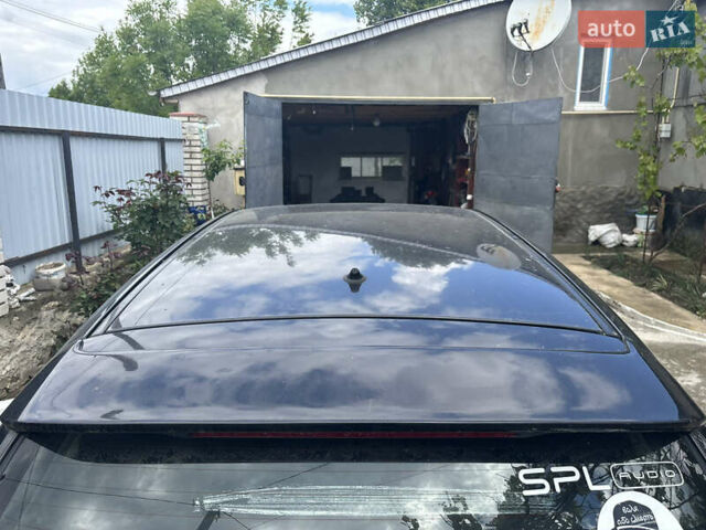 Мазда 323 1999 в Тульчине на Automoto.ua Черный Мазда 323, объемом двигателя 1.5 л и пробегом 247 тыс. км за 2150 $, фото 6 на Automoto.ua