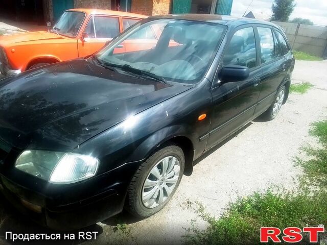 Черный Мазда 323, объемом двигателя 1.5 л и пробегом 0 тыс. км за 2100 $, фото 6 на Automoto.ua