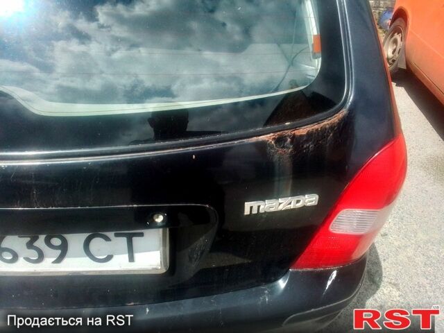 Черный Мазда 323, объемом двигателя 1.5 л и пробегом 0 тыс. км за 2100 $, фото 4 на Automoto.ua