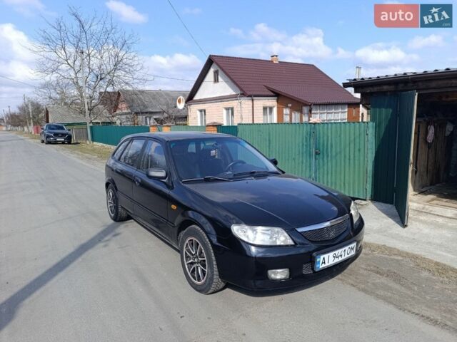Черный Мазда 323, объемом двигателя 1.6 л и пробегом 283 тыс. км за 2150 $, фото 3 на Automoto.ua