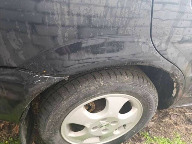 Чорний Мазда 323, об'ємом двигуна 0 л та пробігом 260 тис. км за 1496 $, фото 1 на Automoto.ua