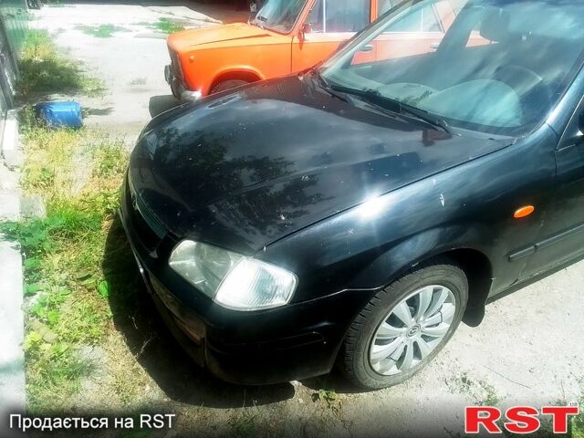 Черный Мазда 323, объемом двигателя 1.5 л и пробегом 0 тыс. км за 2100 $, фото 7 на Automoto.ua