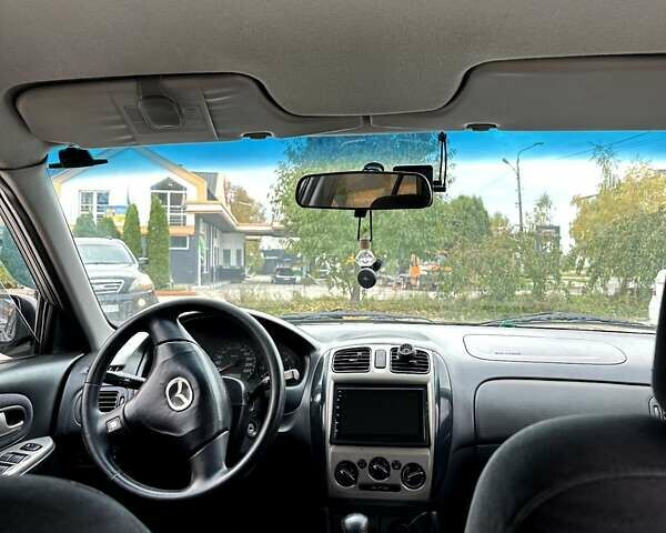 Черный Мазда 323, объемом двигателя 2 л и пробегом 286 тыс. км за 3200 $, фото 11 на Automoto.ua