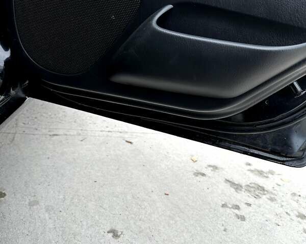 Черный Мазда 323, объемом двигателя 2 л и пробегом 286 тыс. км за 3200 $, фото 12 на Automoto.ua