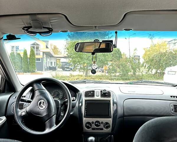 Черный Мазда 323, объемом двигателя 2 л и пробегом 286 тыс. км за 3200 $, фото 9 на Automoto.ua