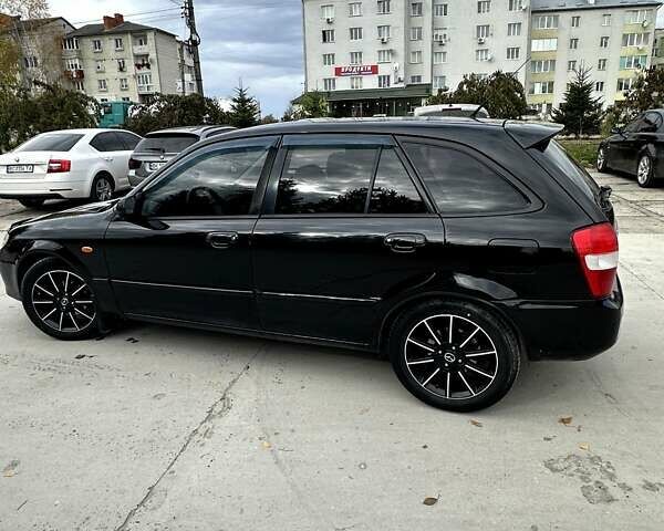 Черный Мазда 323, объемом двигателя 2 л и пробегом 286 тыс. км за 3200 $, фото 10 на Automoto.ua