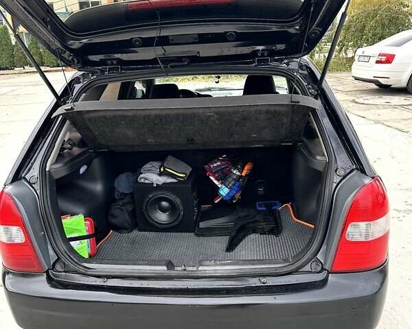 Черный Мазда 323, объемом двигателя 2 л и пробегом 286 тыс. км за 3200 $, фото 13 на Automoto.ua