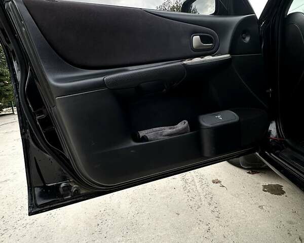 Черный Мазда 323, объемом двигателя 2 л и пробегом 286 тыс. км за 3200 $, фото 17 на Automoto.ua