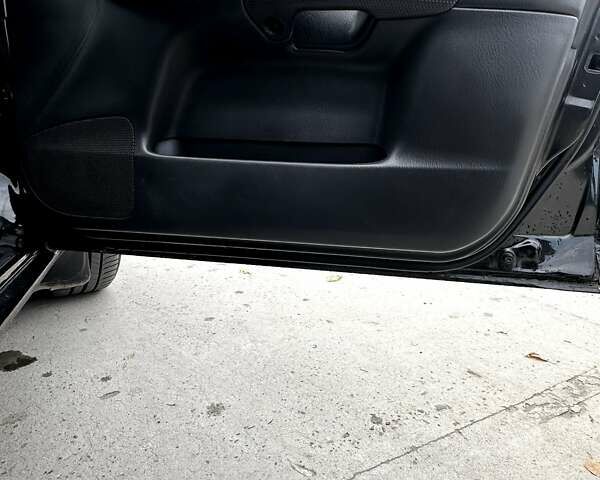 Черный Мазда 323, объемом двигателя 2 л и пробегом 286 тыс. км за 3200 $, фото 14 на Automoto.ua