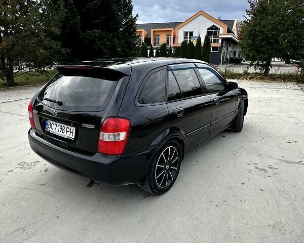 Черный Мазда 323, объемом двигателя 2 л и пробегом 286 тыс. км за 3200 $, фото 8 на Automoto.ua