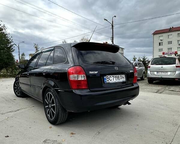 Черный Мазда 323, объемом двигателя 2 л и пробегом 286 тыс. км за 3200 $, фото 3 на Automoto.ua