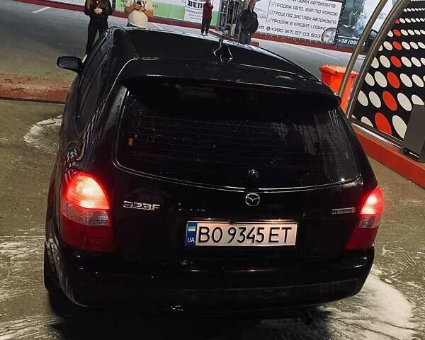 Черный Мазда 323, объемом двигателя 1.6 л и пробегом 250 тыс. км за 2500 $, фото 5 на Automoto.ua