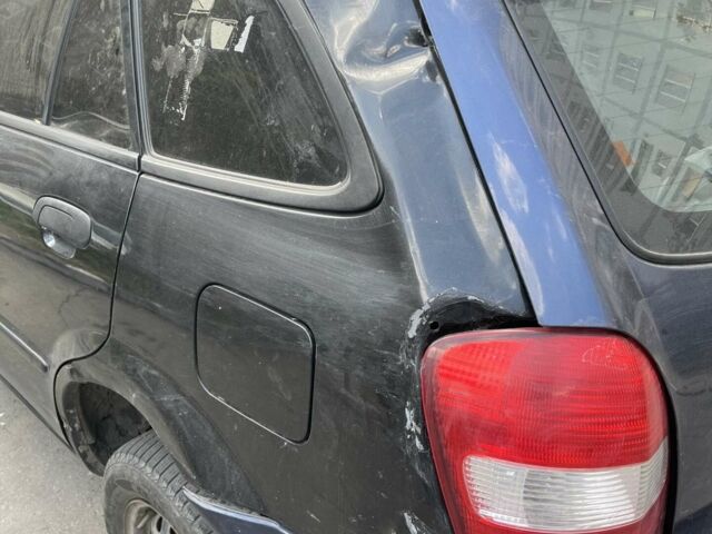 Чорний Мазда 323, об'ємом двигуна 2 л та пробігом 277 тис. км за 1342 $, фото 5 на Automoto.ua