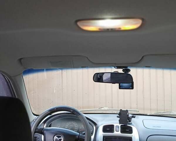 Черный Мазда 323, объемом двигателя 1.6 л и пробегом 305 тыс. км за 3800 $, фото 66 на Automoto.ua