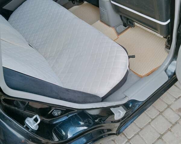 Черный Мазда 323, объемом двигателя 1.6 л и пробегом 305 тыс. км за 3800 $, фото 19 на Automoto.ua