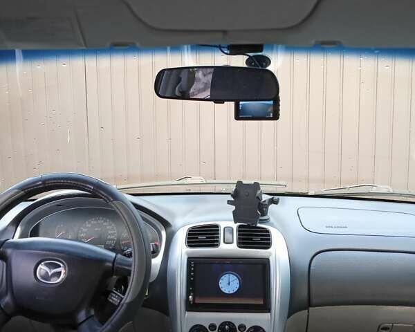 Черный Мазда 323, объемом двигателя 1.6 л и пробегом 305 тыс. км за 3800 $, фото 63 на Automoto.ua