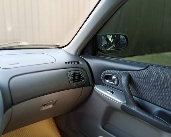 Черный Мазда 323, объемом двигателя 1.6 л и пробегом 305 тыс. км за 3800 $, фото 62 на Automoto.ua