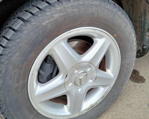 Черный Мазда 323, объемом двигателя 1.6 л и пробегом 305 тыс. км за 3800 $, фото 39 на Automoto.ua