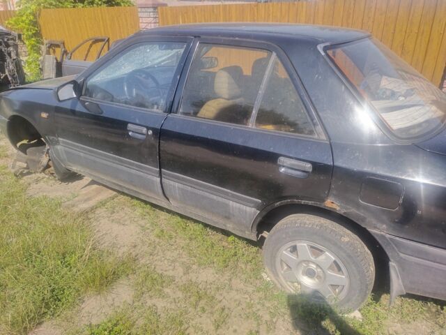 Чорний Мазда 323, об'ємом двигуна 0 л та пробігом 300 тис. км за 350 $, фото 2 на Automoto.ua