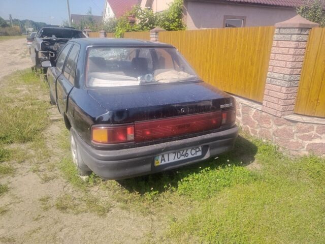 Чорний Мазда 323, об'ємом двигуна 0 л та пробігом 300 тис. км за 350 $, фото 1 на Automoto.ua