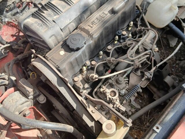 Черный Мазда 323, объемом двигателя 1.7 л и пробегом 750 тыс. км за 400 $, фото 2 на Automoto.ua