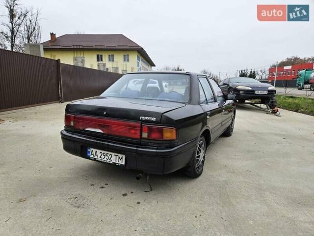 Чорний Мазда 323, об'ємом двигуна 1.5 л та пробігом 450 тис. км за 1200 $, фото 3 на Automoto.ua