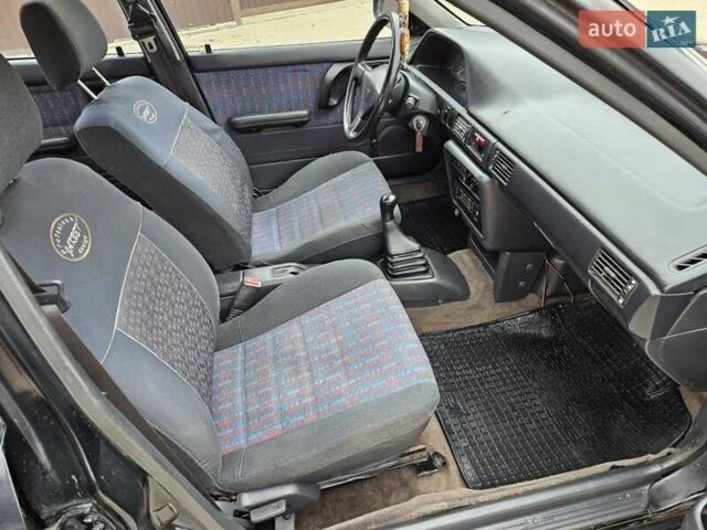 Чорний Мазда 323, об'ємом двигуна 1.5 л та пробігом 450 тис. км за 1200 $, фото 23 на Automoto.ua