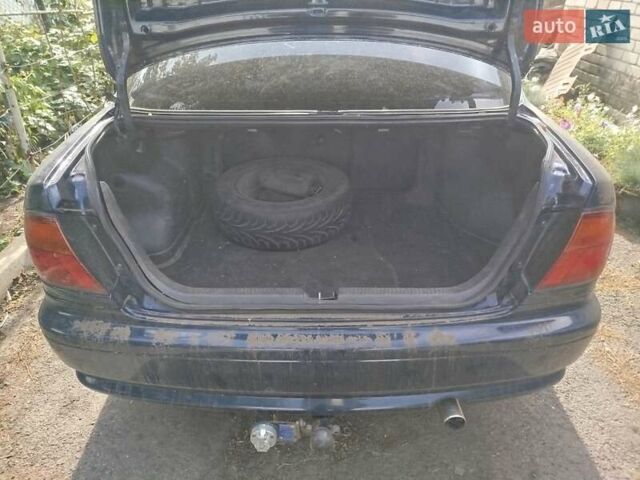 Черный Мазда 323, объемом двигателя 1.49 л и пробегом 319 тыс. км за 2400 $, фото 3 на Automoto.ua