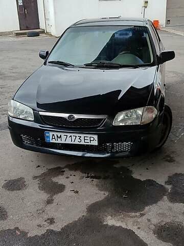 Черный Мазда 323, объемом двигателя 1.8 л и пробегом 383 тыс. км за 1214 $, фото 5 на Automoto.ua