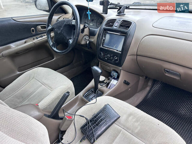 Черный Мазда 323, объемом двигателя 1.6 л и пробегом 215 тыс. км за 2300 $, фото 6 на Automoto.ua