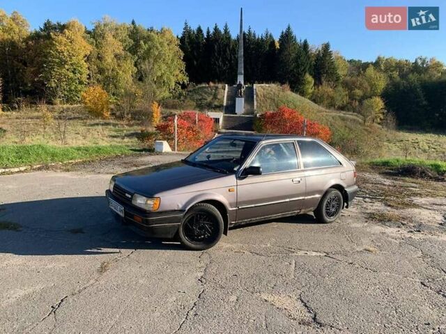 Коричневый Мазда 323, объемом двигателя 1.3 л и пробегом 475 тыс. км за 1300 $, фото 7 на Automoto.ua